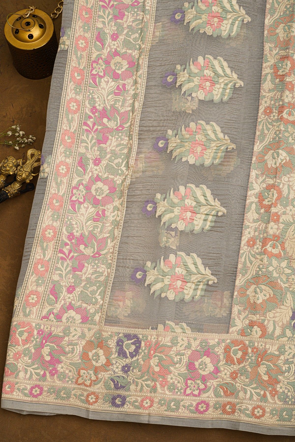 Fancy Organza Grey Saree With Florals And Buttis Body And Self Florals And Leaves Jaal Border