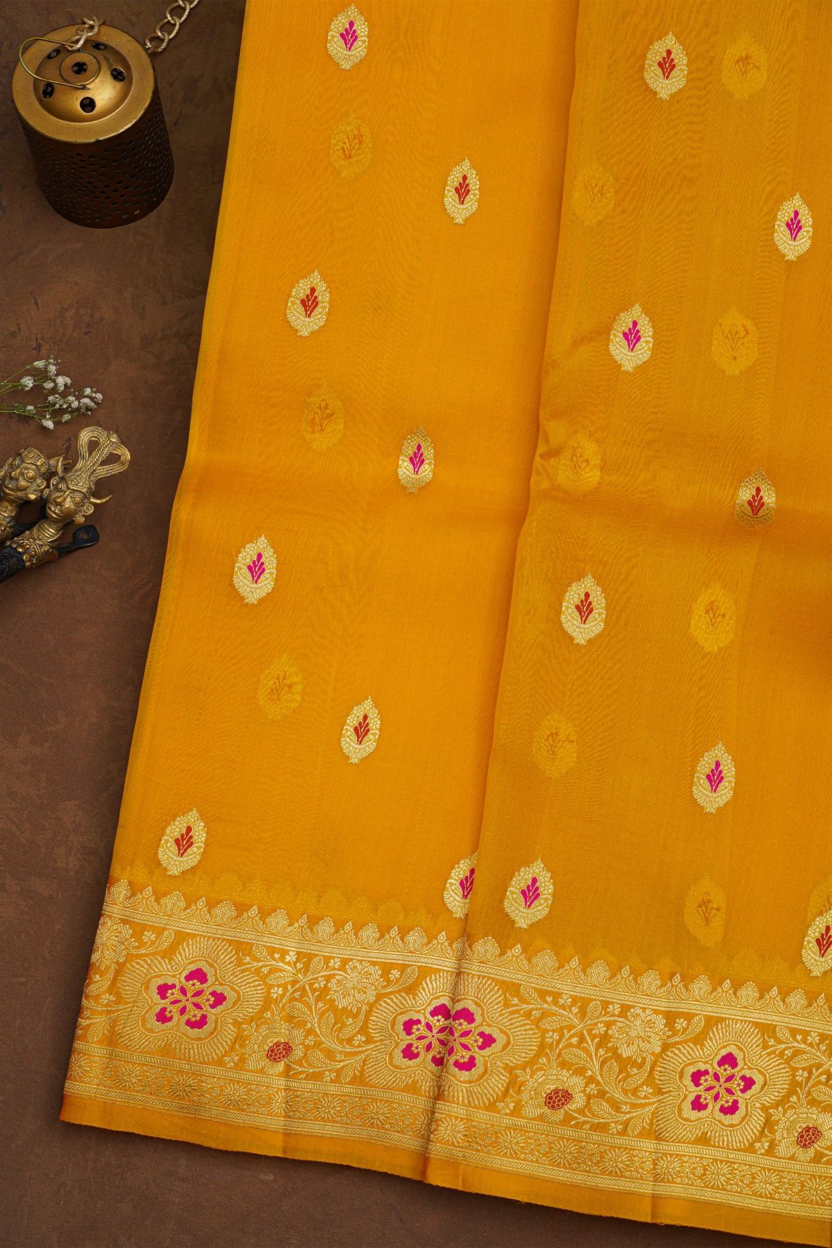 Fancy Organza Mustard Saree With Florals And Buttis Body And Self Florals And Leaves Jaal Border