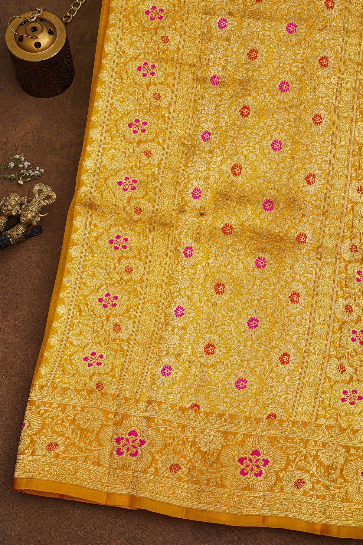 Fancy Organza Mustard Saree With Florals And Buttis Body And Self Florals And Leaves Jaal Border