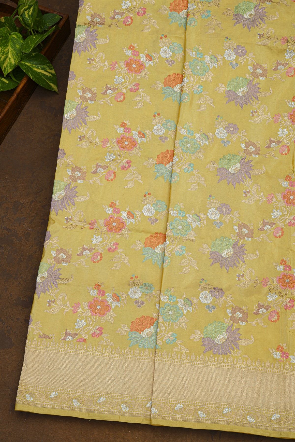 Banarasi Silk Pale Yellow Saree With Cross Lines Florals And Jaal Border