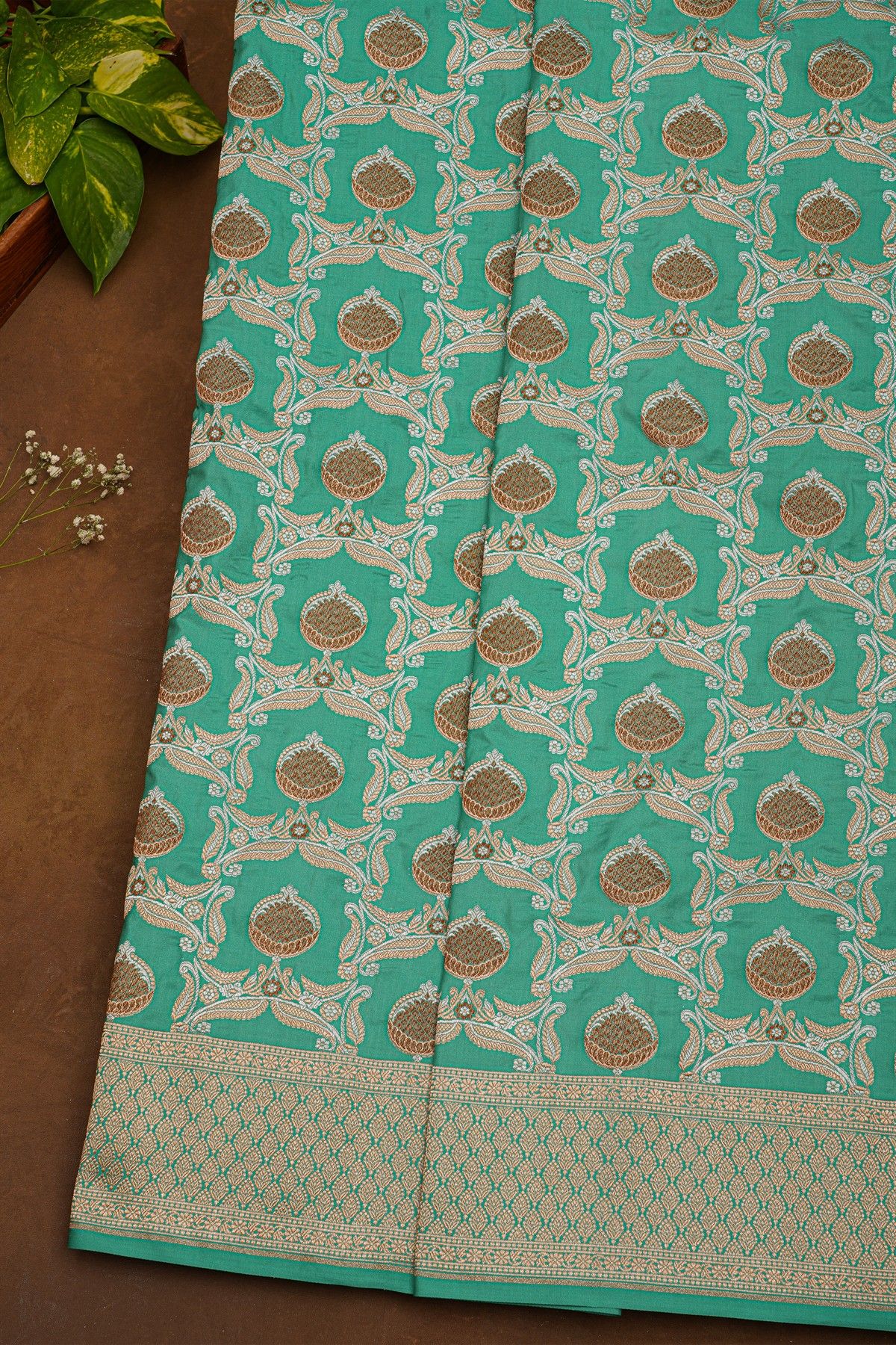 Banarasi Silk Sea Green Saree With Florals And Leaves Border