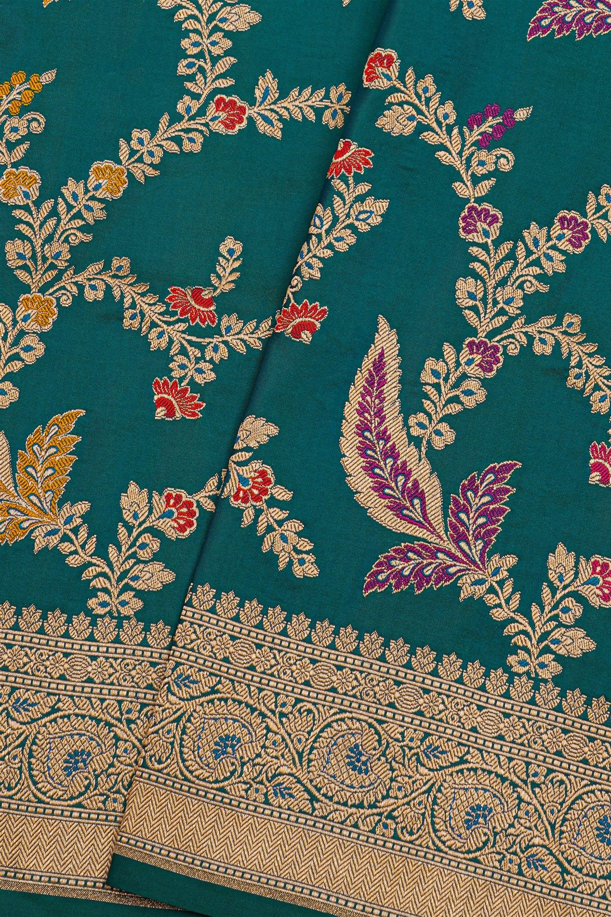 Banarasi Silk Peacock Blue Saree With Florals And Leaves Jaal Border