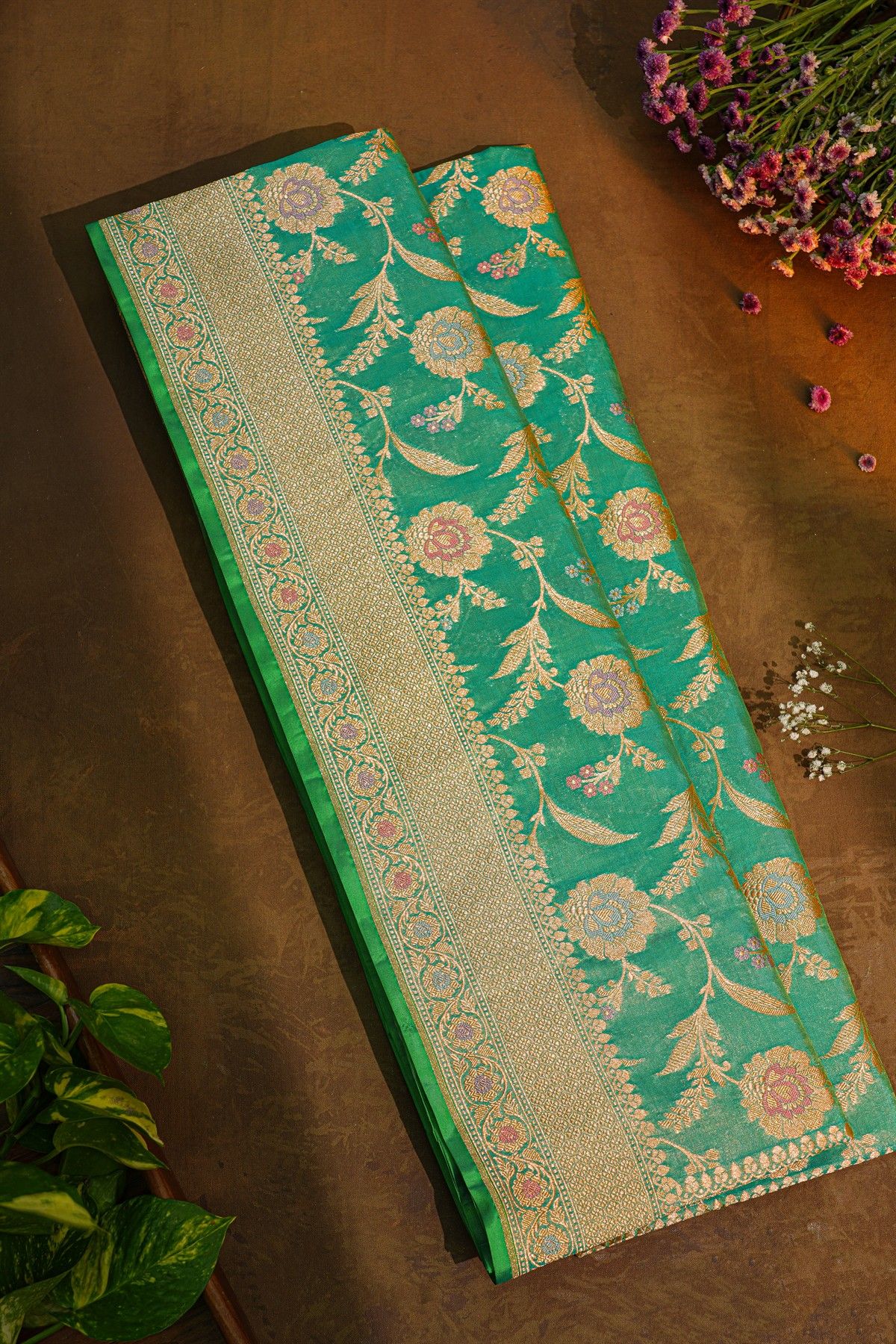 Banarasi Silk Sea Green Saree With Florals And Leaves Border