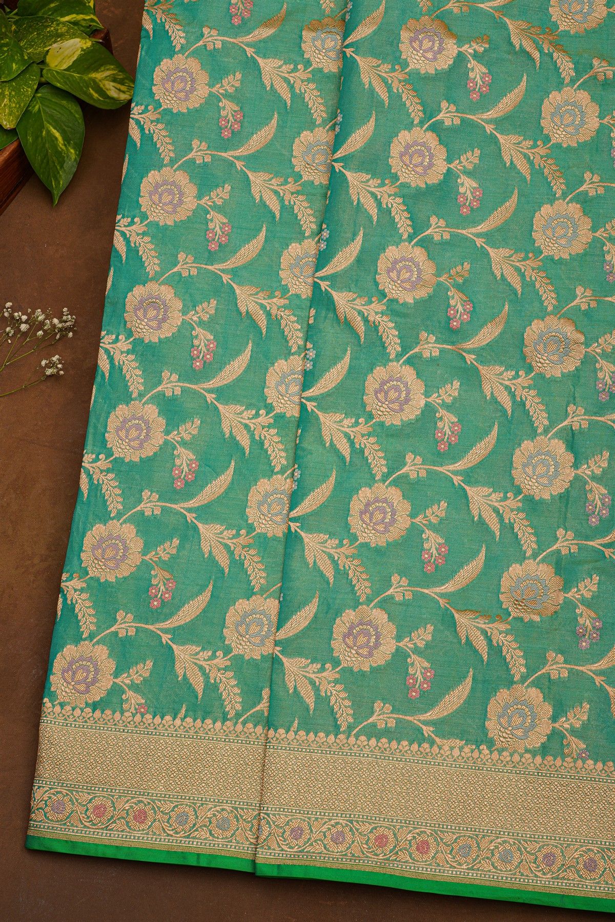 Banarasi Silk Sea Green Saree With Florals And Leaves Border