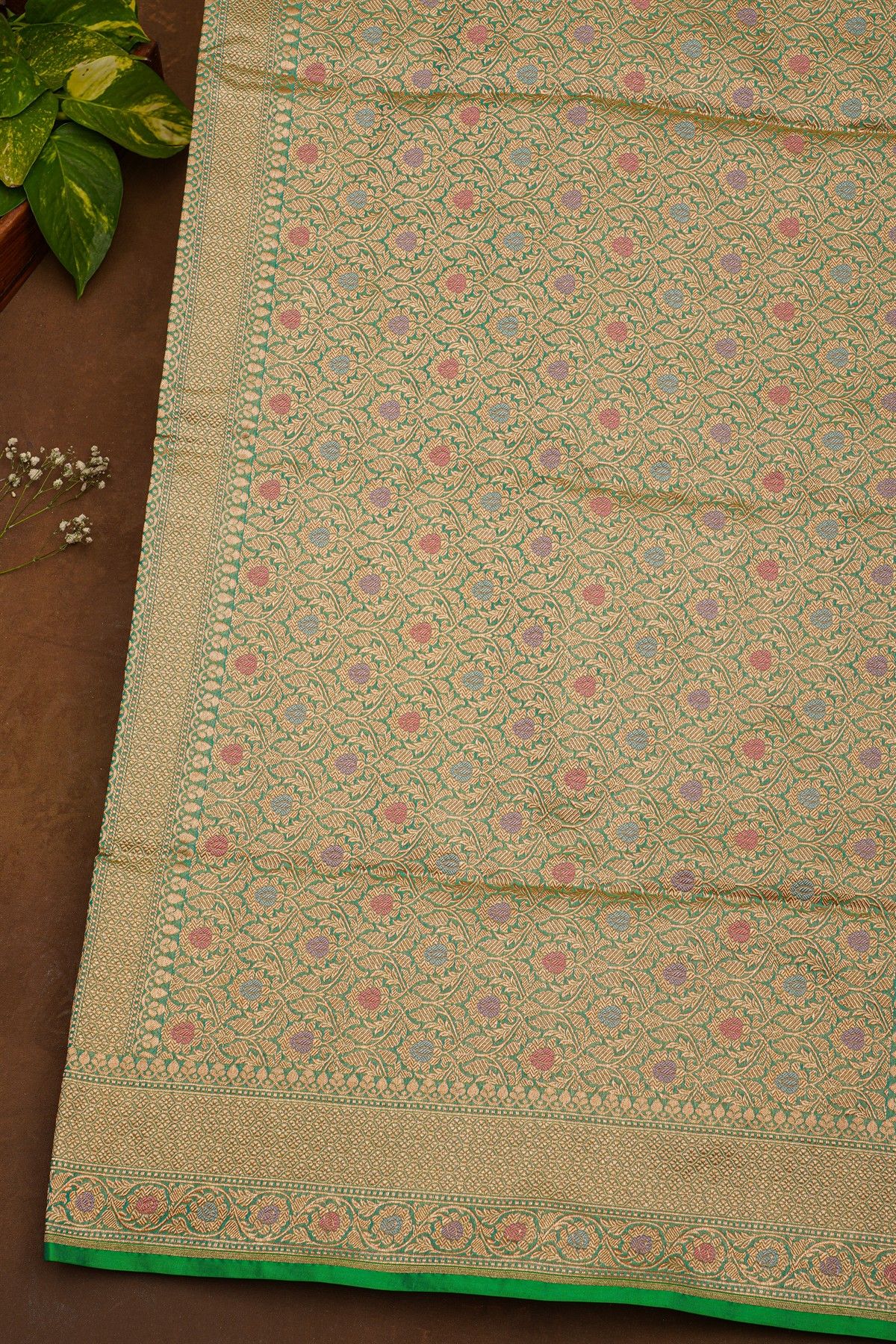 Banarasi Silk Sea Green Saree With Florals And Leaves Border