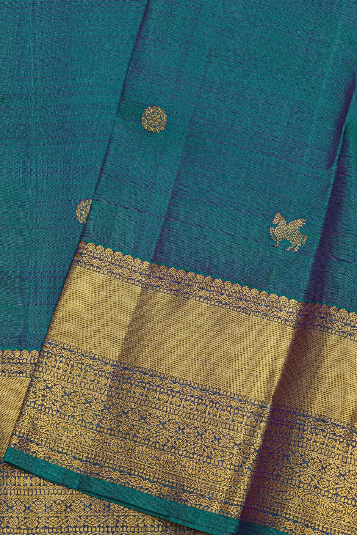 Kancheepuram Pure Silk Teal Blue Saree With Body Florals And Leaves Jaal With Zari Border