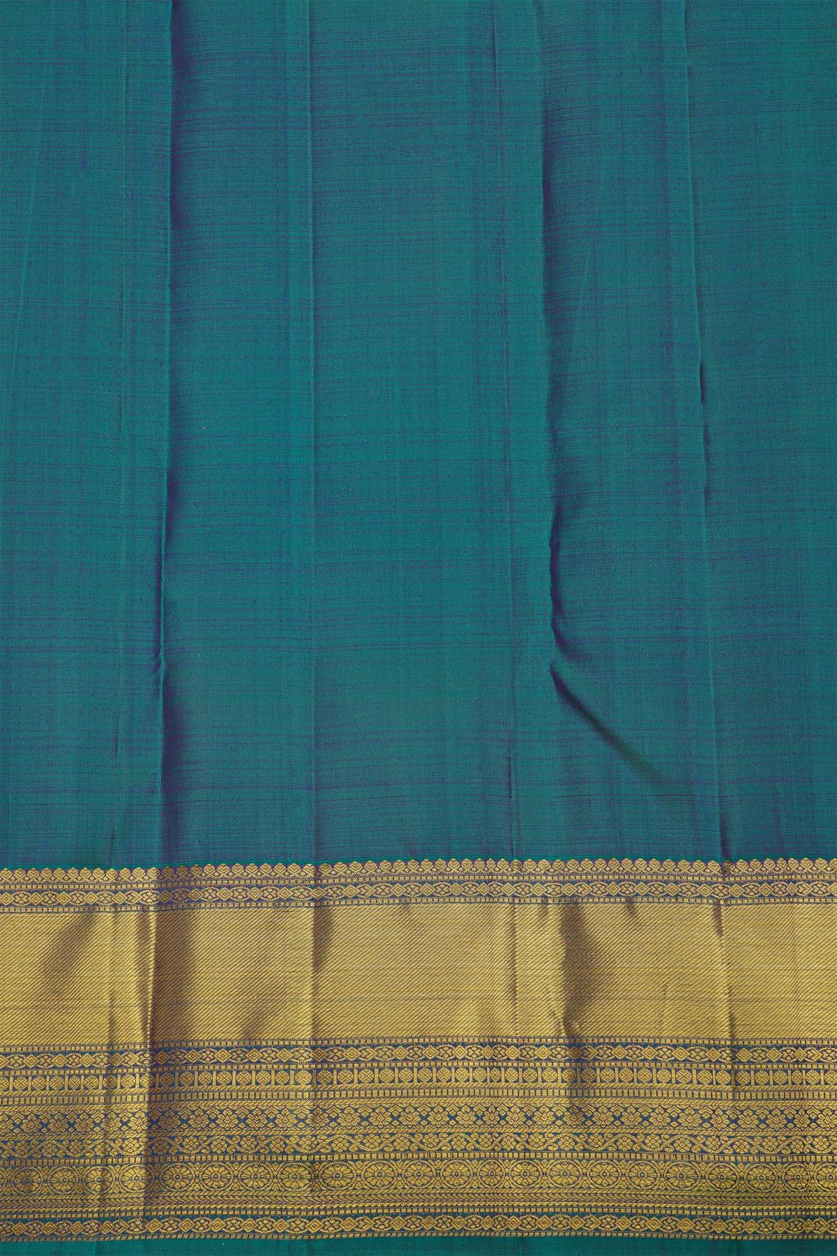 Kancheepuram Pure Silk Teal Blue Saree With Body Florals And Leaves Jaal With Zari Border