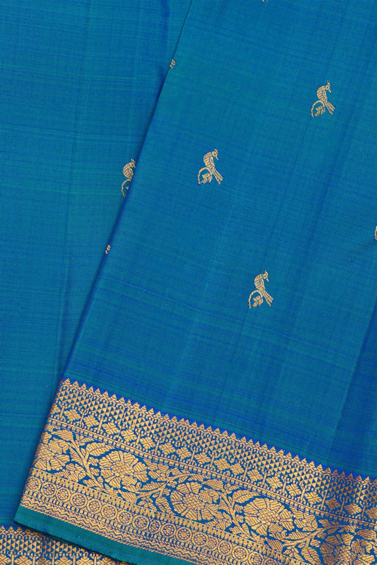 Kancheepuram Pure Silk Sky Blue Saree With Florals And Leaves With Peacocks Border