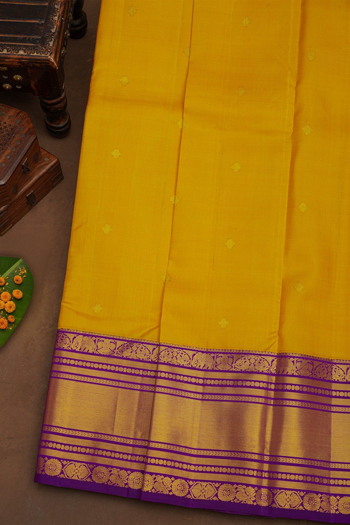 Kancheepuram Silk Yellow Saree With Cross Lines, Florals And Animals Border