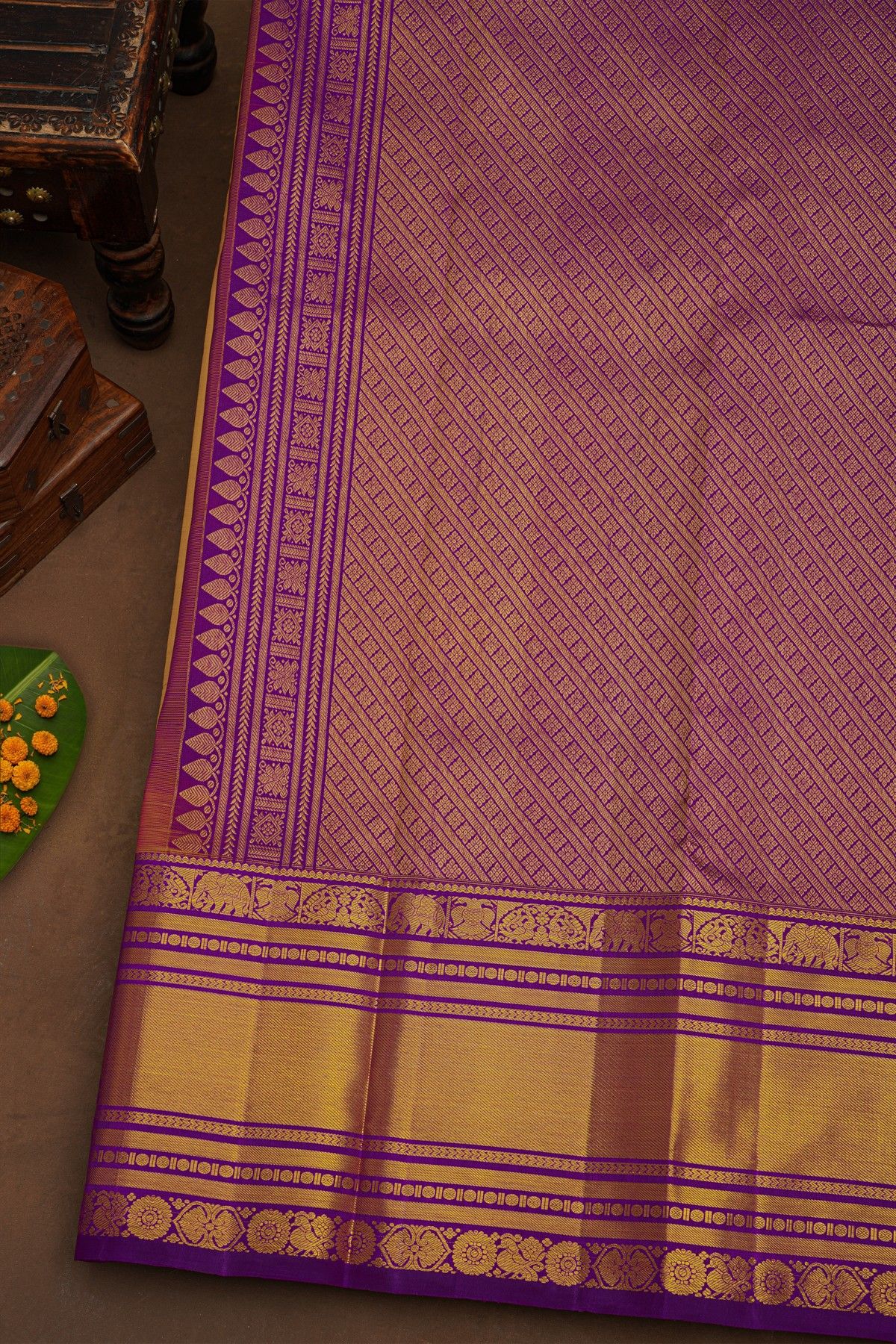 Kancheepuram Silk Yellow Saree With Cross Lines, Florals And Animals Border