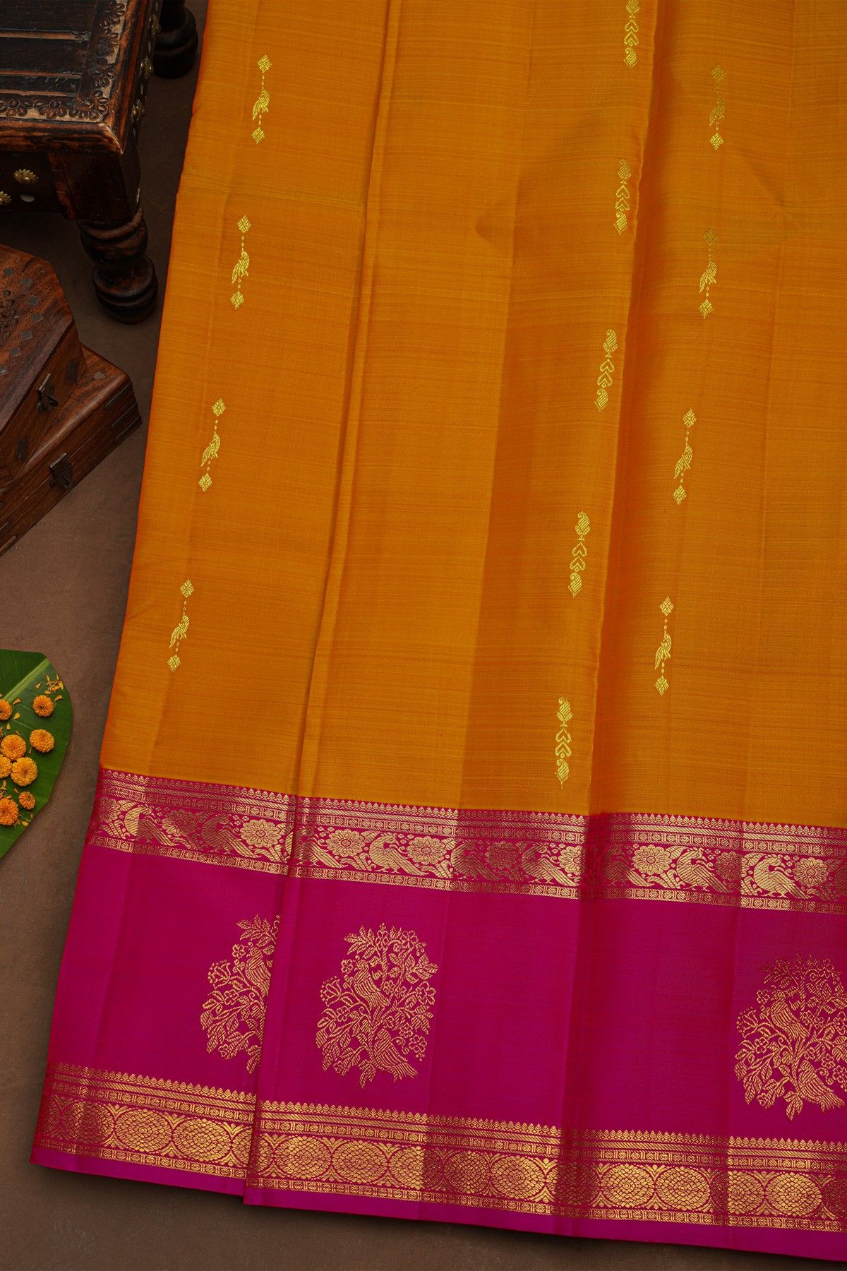 Kancheepuram Pure Silk Orange Saree With Florals And Peacocks Gap Border