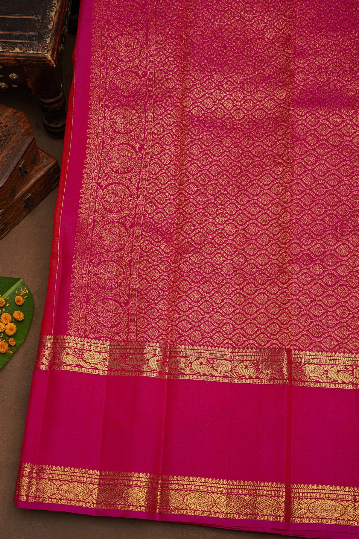 Kancheepuram Pure Silk Orange Saree With Florals And Peacocks Gap Border