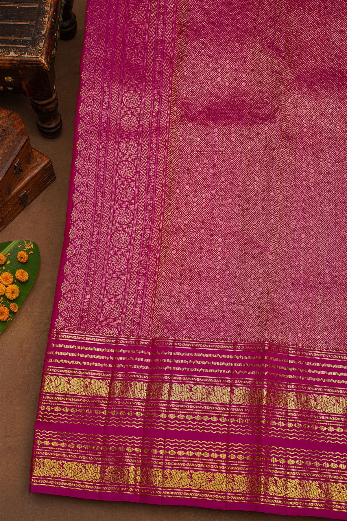 Kancheepuram Pure Silk Orange Saree With Florals And Peacocks Border