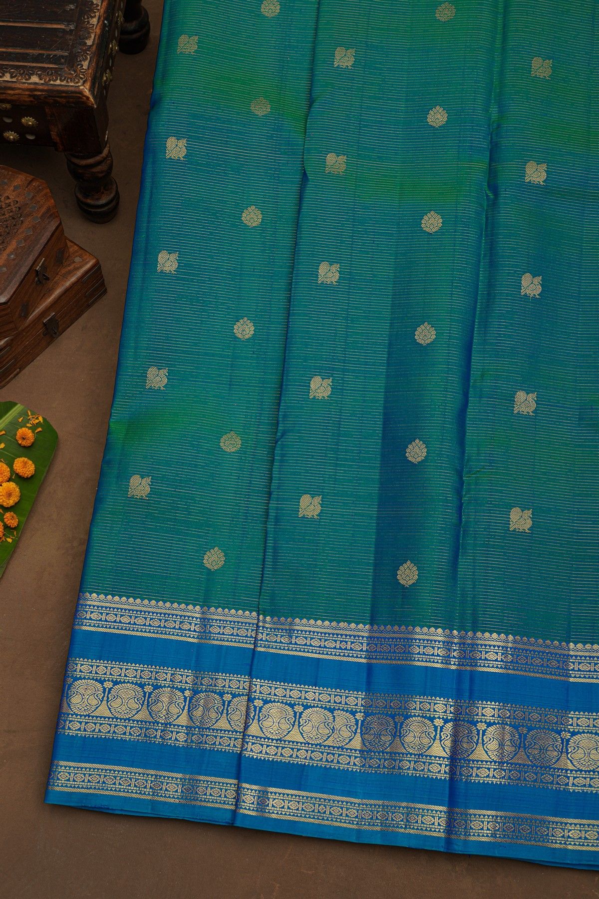 Kancheepuram Pure Silk Peacock Green Green Saree With Florals And Leaves Border