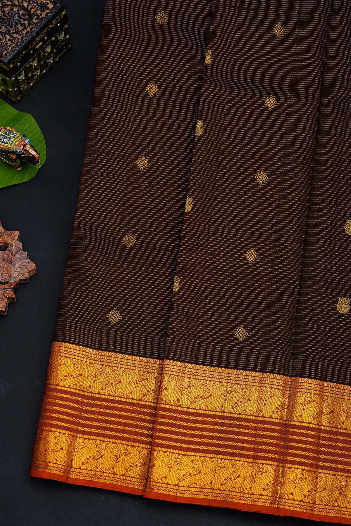 Kancheepuram Silk Brown Saree With Florals And Peacocks With Zari Lines Border