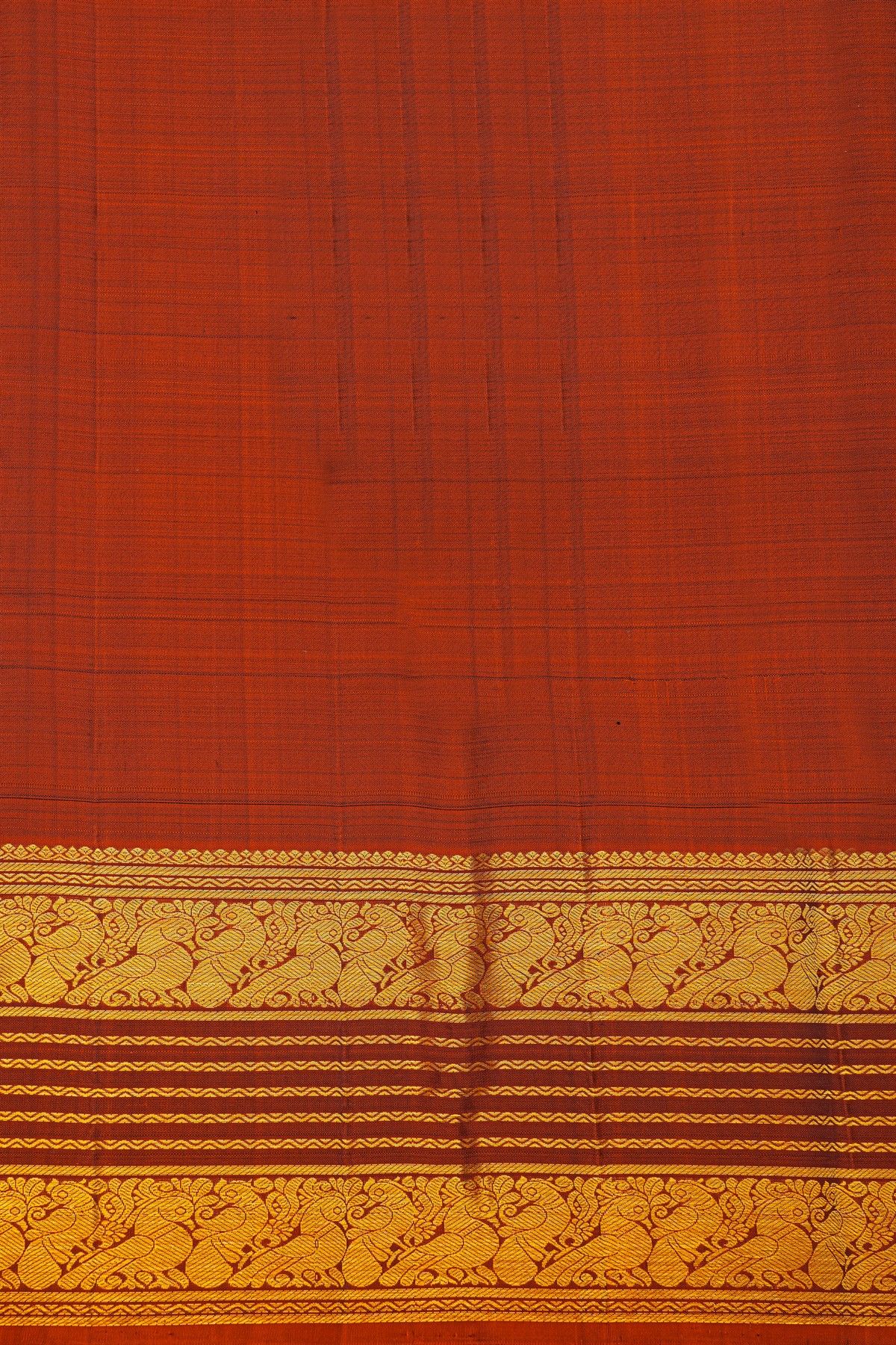 Kancheepuram Silk Brown Saree With Florals And Peacocks With Zari Lines Border