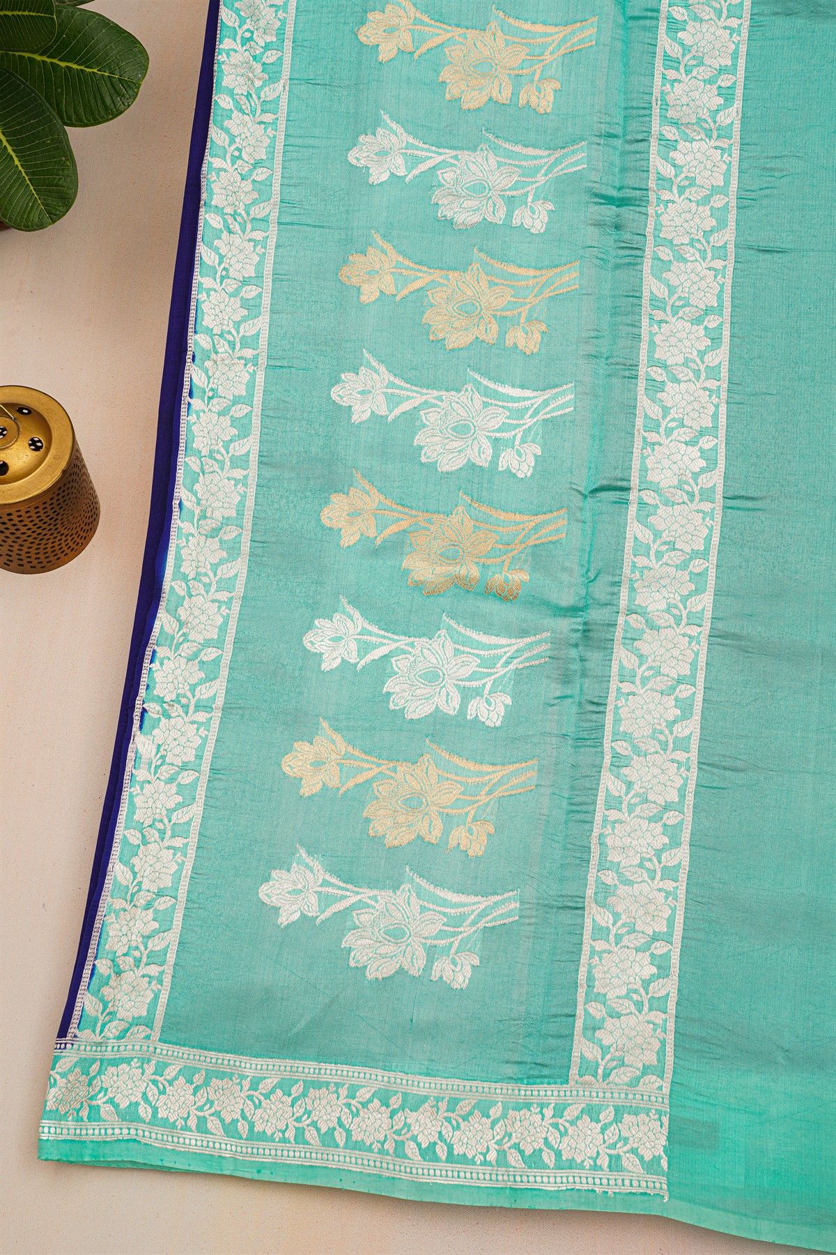 Fancy Matka Silk Royal Blue Saree With Buttis Body And Contrast Florals And Leaves Border
