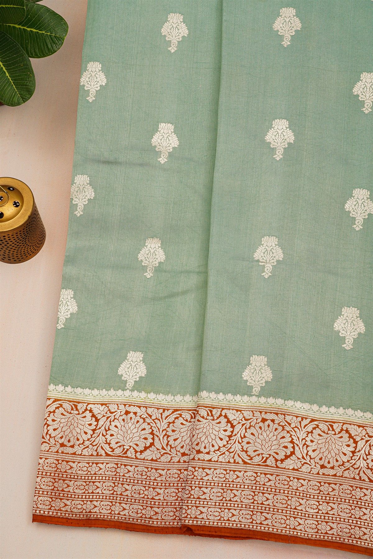 Fancy Matka Silk Sage Green Saree With Florals And Buttis Body And Contrast Florals And Leaves Jaal Border