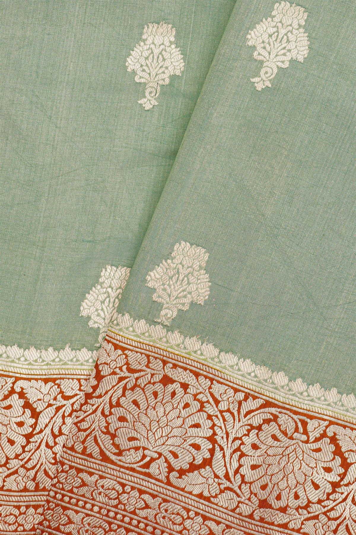 Fancy Matka Silk Sage Green Saree With Florals And Buttis Body And Contrast Florals And Leaves Jaal Border