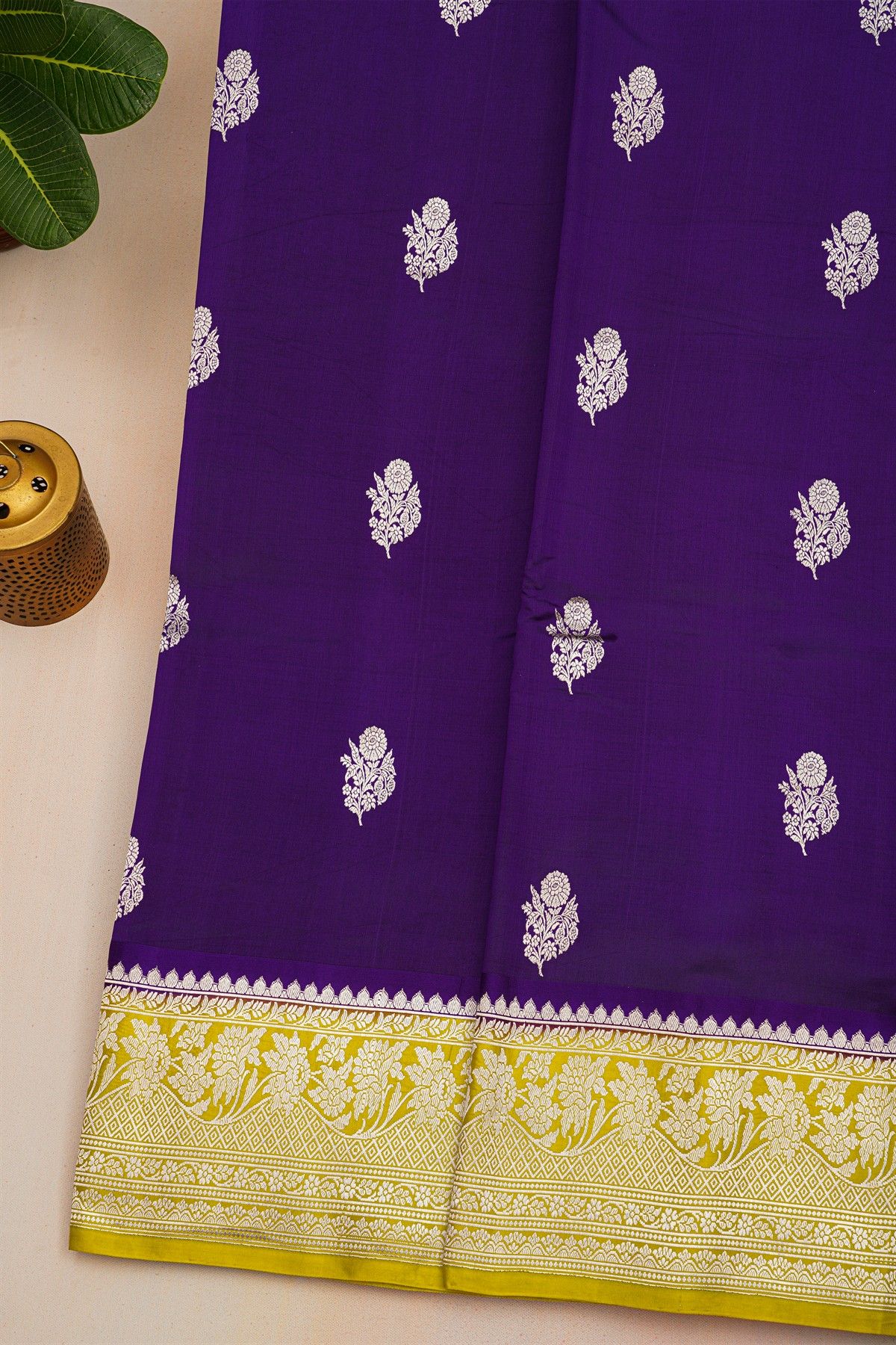 Fancy Matka Silk Dark Violet Saree With Florals And Buttis Body And Contrast Florals And Leaves Border
