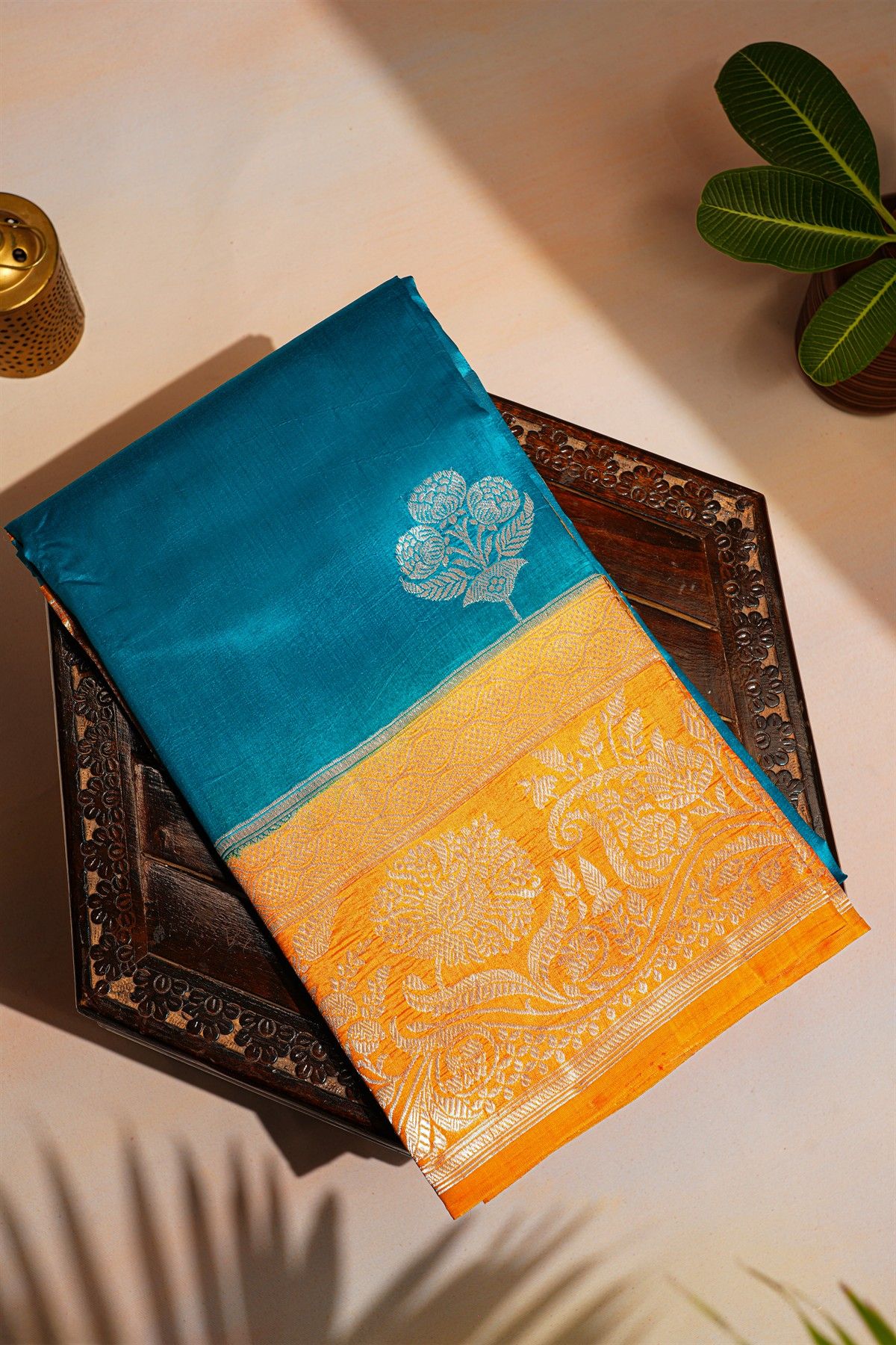 Fancy Matka Silk Peacock Blue Saree With Florals And Buttis Body And Contrast Florals And Leaves Jaal Border