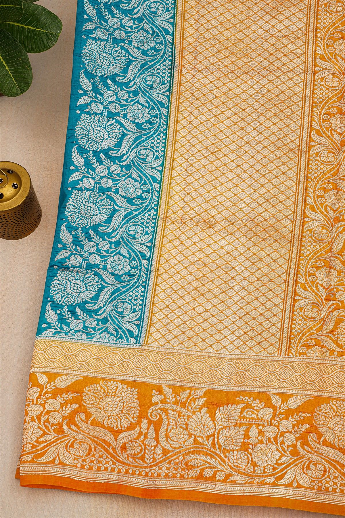 Fancy Matka Silk Peacock Blue Saree With Florals And Buttis Body And Contrast Florals And Leaves Jaal Border