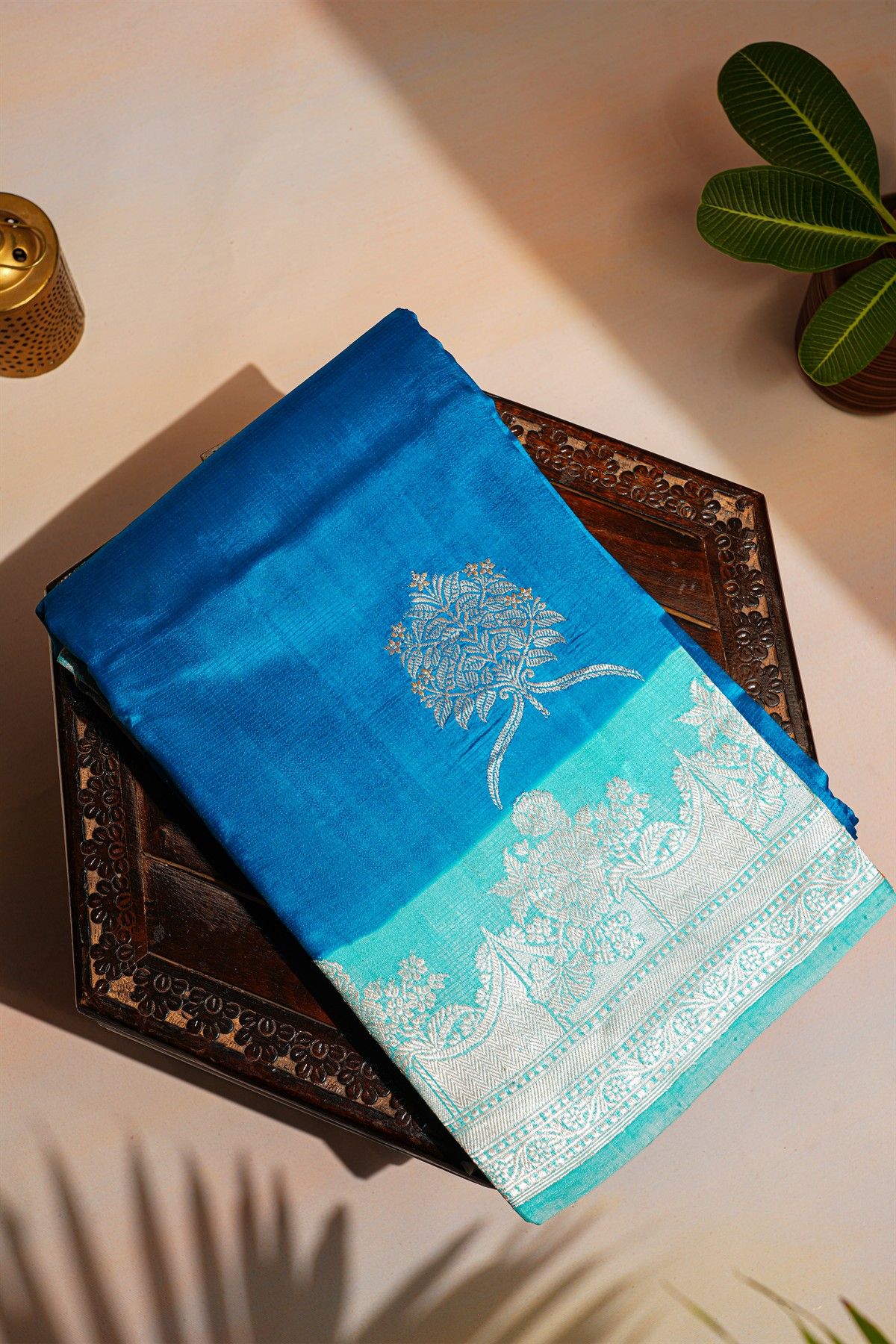 Fancy Matka Silk Royal Blue Saree With Florals And Buttis Body And Contrast Florals And Leaves Border