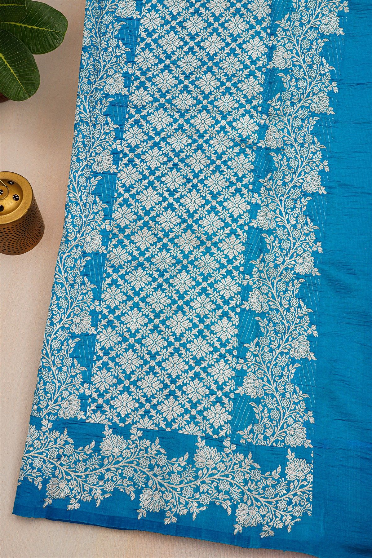Fancy Matka Silk Sea Green Saree With Florals And Buttis Body And Contrast Florals And Leaves Border