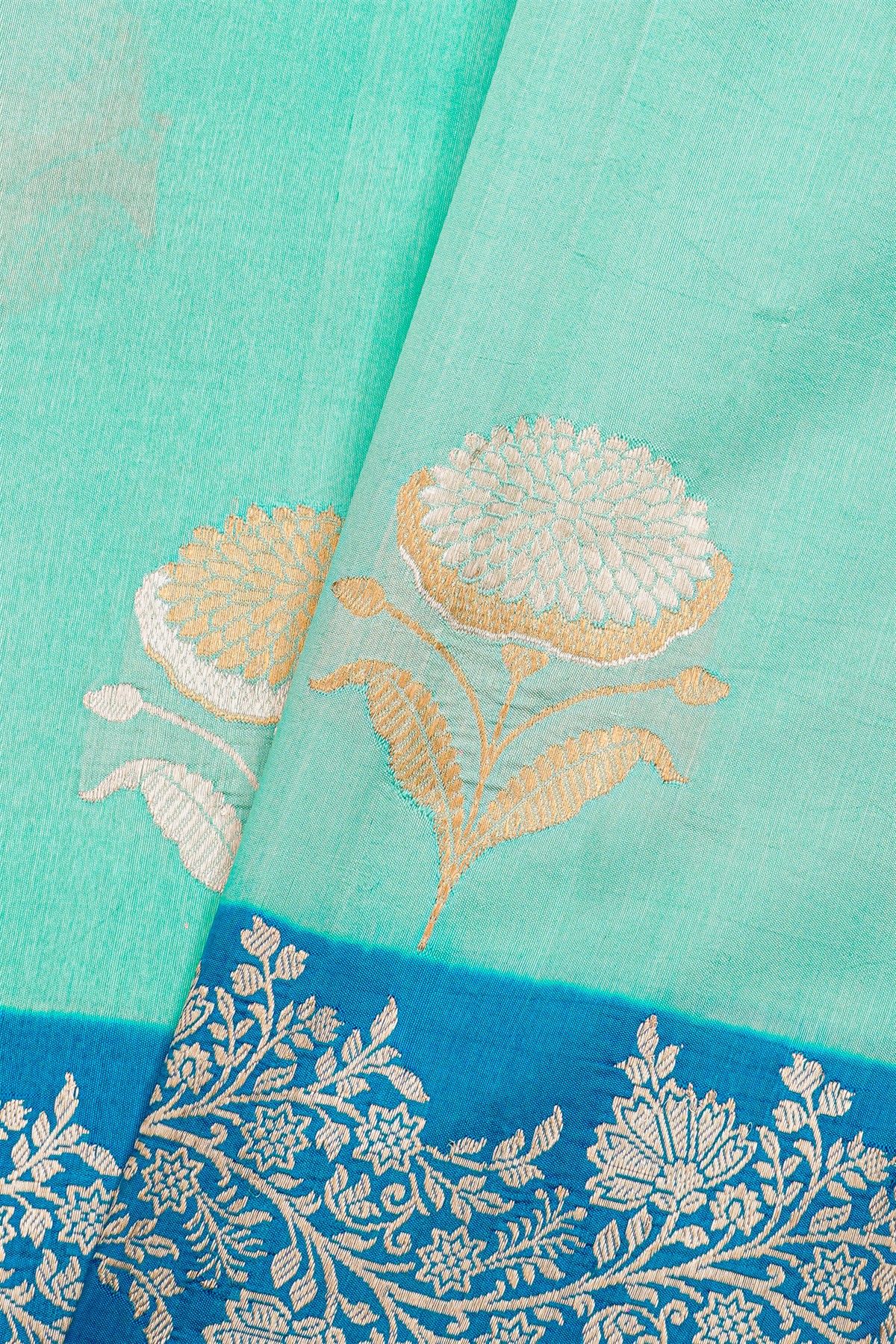 Fancy Matka Silk Sea Green Saree With Florals And Buttis Body And Contrast Florals And Leaves Border