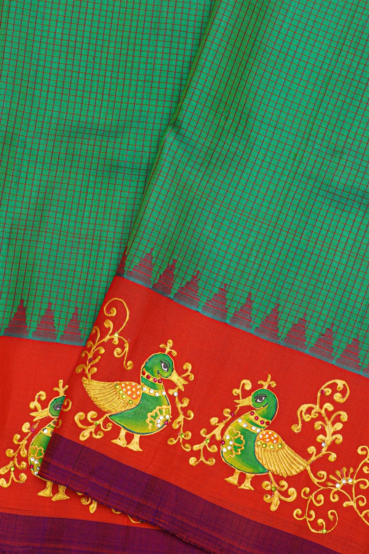 Gadwal Silk Bottle Green Saree With Floral Jaal With Peacocks In Hand Printed Border