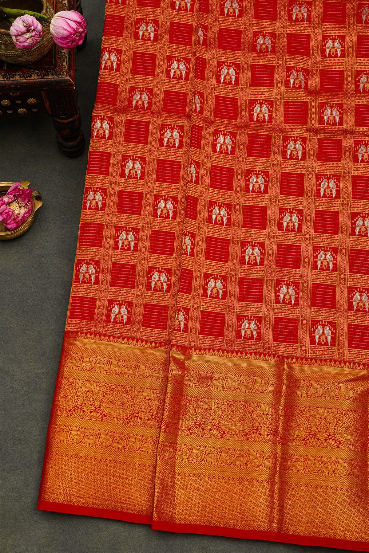 Kancheepuram Silk Red Saree With Parrot Buttis In Checks Body