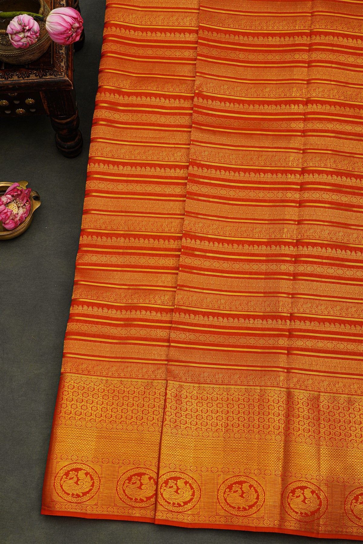Kancheepuram Silk Maroon Saree Strips With Self Florals And Peacocks In Zari Border