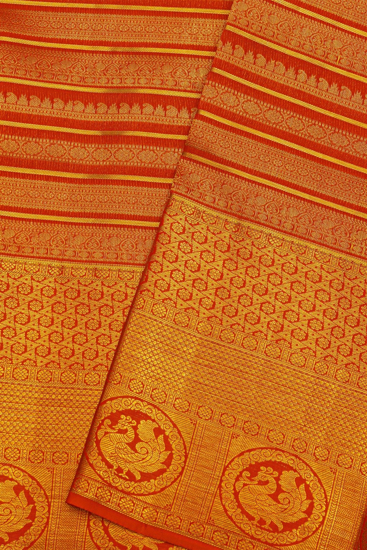 Kancheepuram Silk Maroon Saree Strips With Self Florals And Peacocks In Zari Border