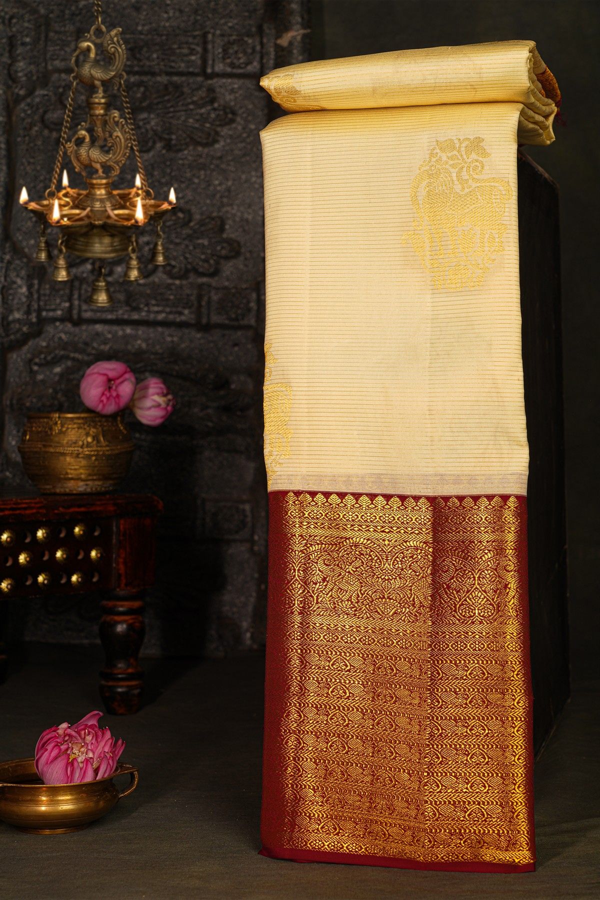 Kancheepuram Silk Cream Saree With Animal Buttis Body And Contrast Florals And Leaves With Animals Border