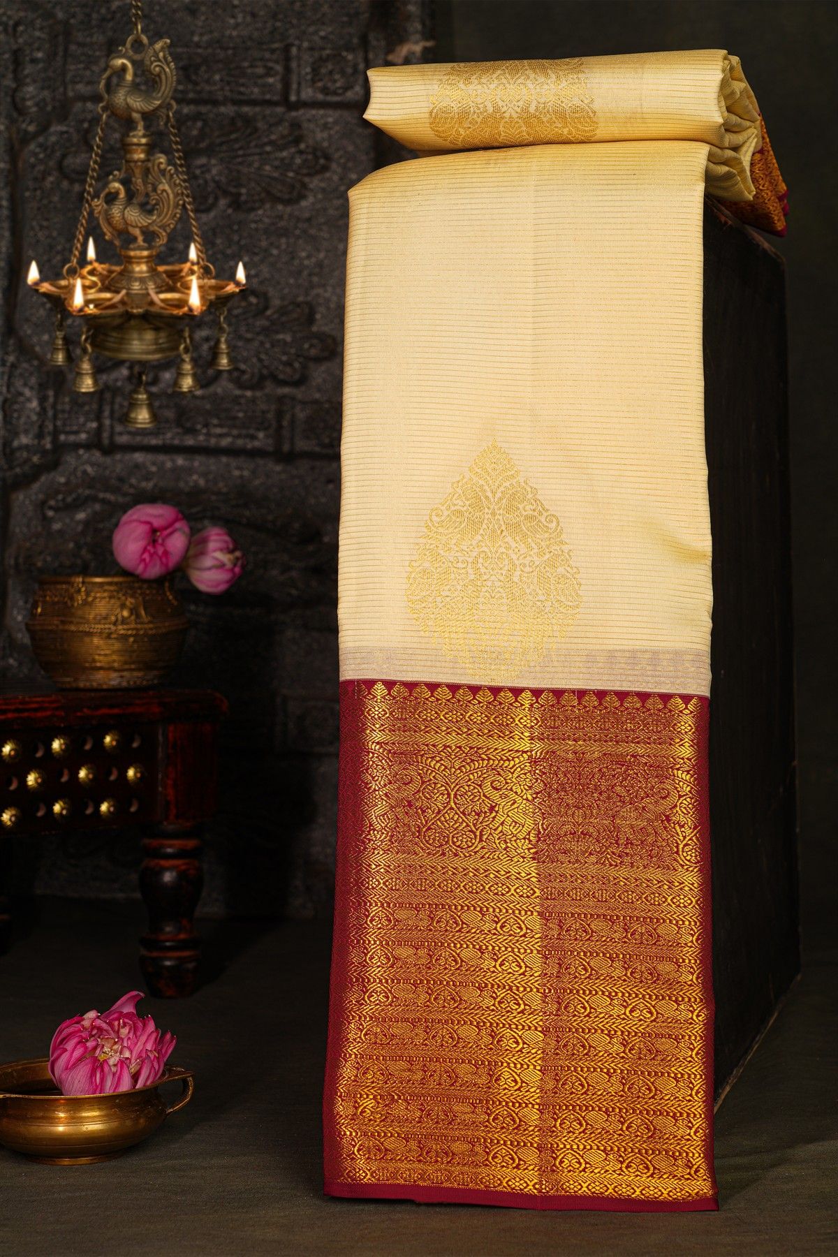Kancheepuram Silk Off White Saree With Florals And Buttis Body And Contrast Florals And Leaves With Animals Border