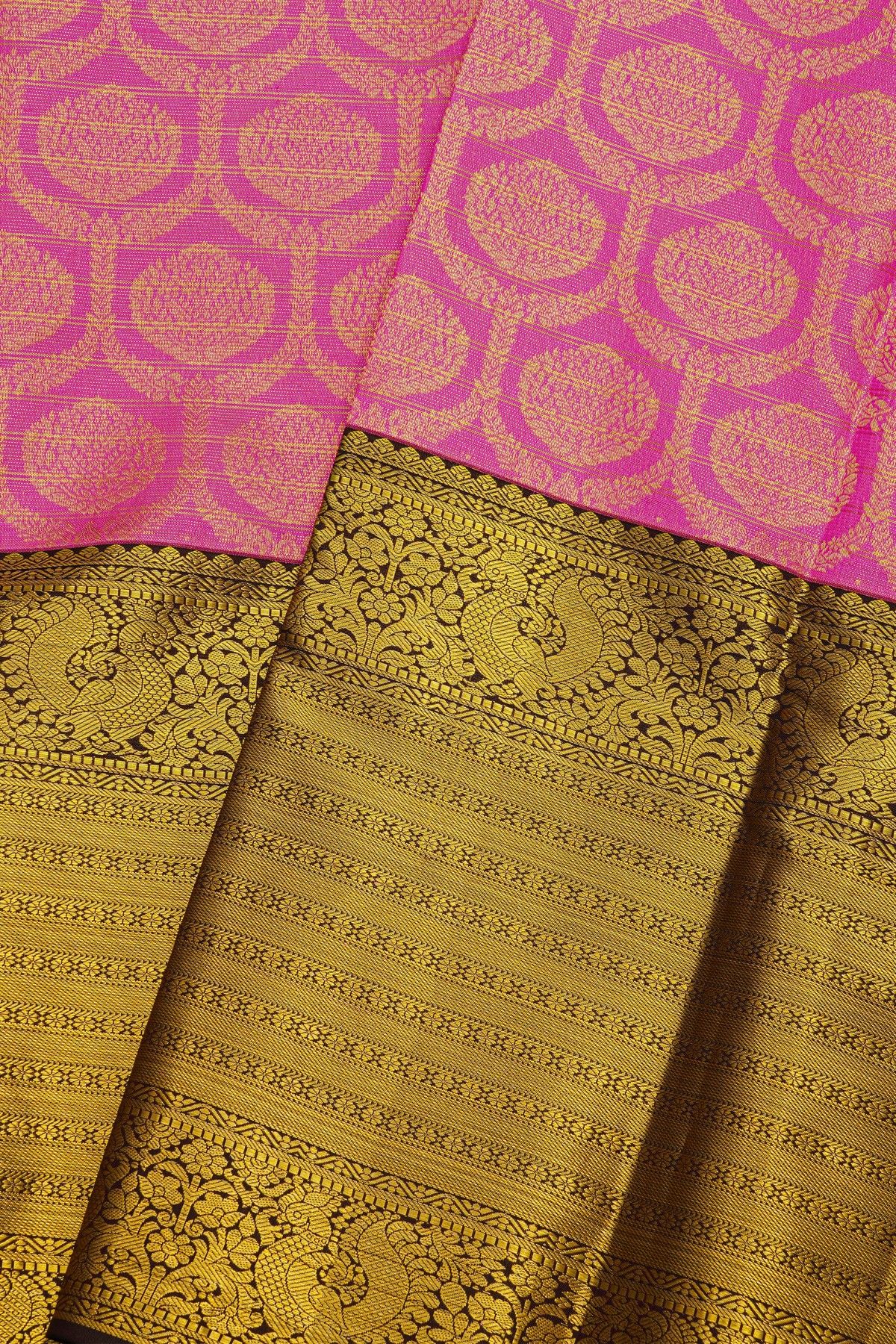 Kancheepuram Silk Pink Saree With Florals And Leaves Body And Contrast Florals And Leaves With Peacocks Border