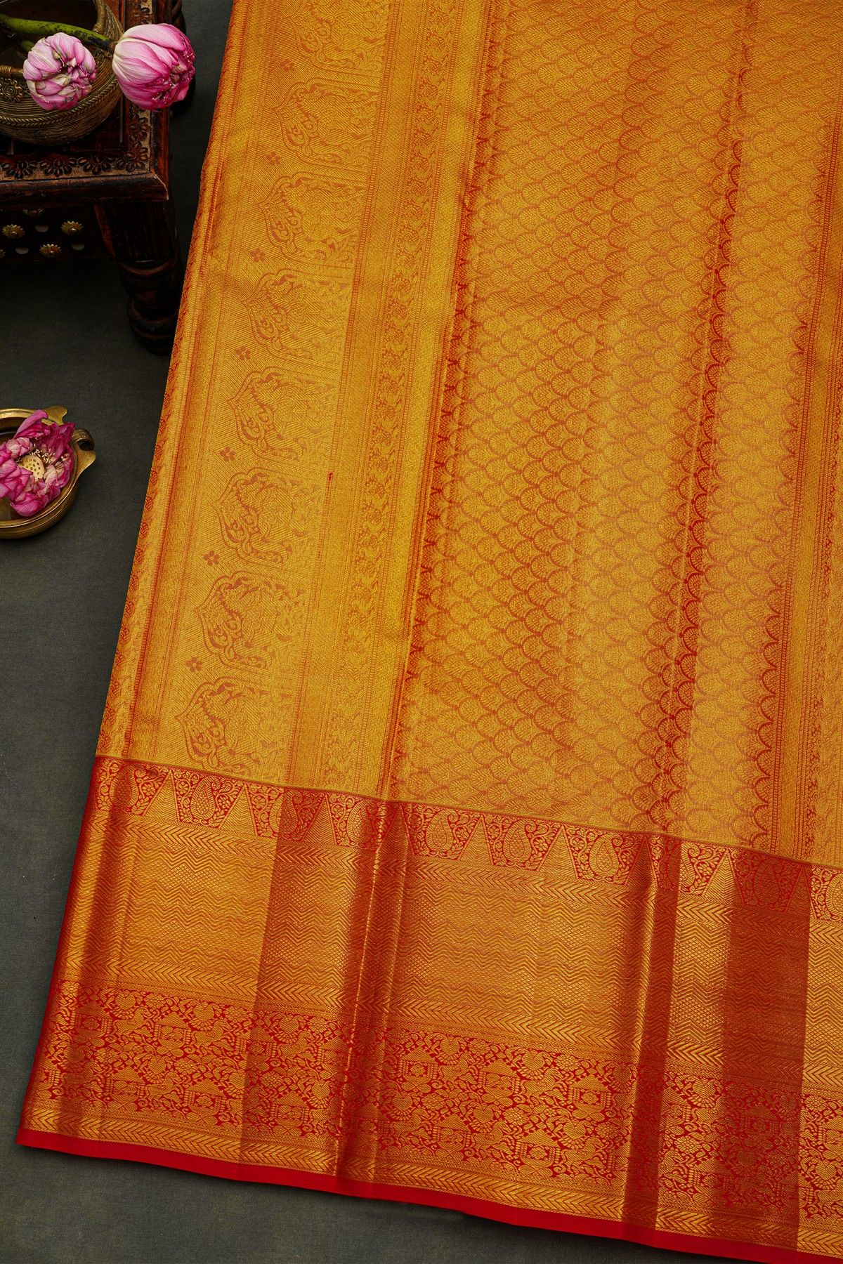 Kancheepuram Silk Gold Saree With Florals And Leaves Body And Contrast Zig-Zag Lines With Florals And Animals Border