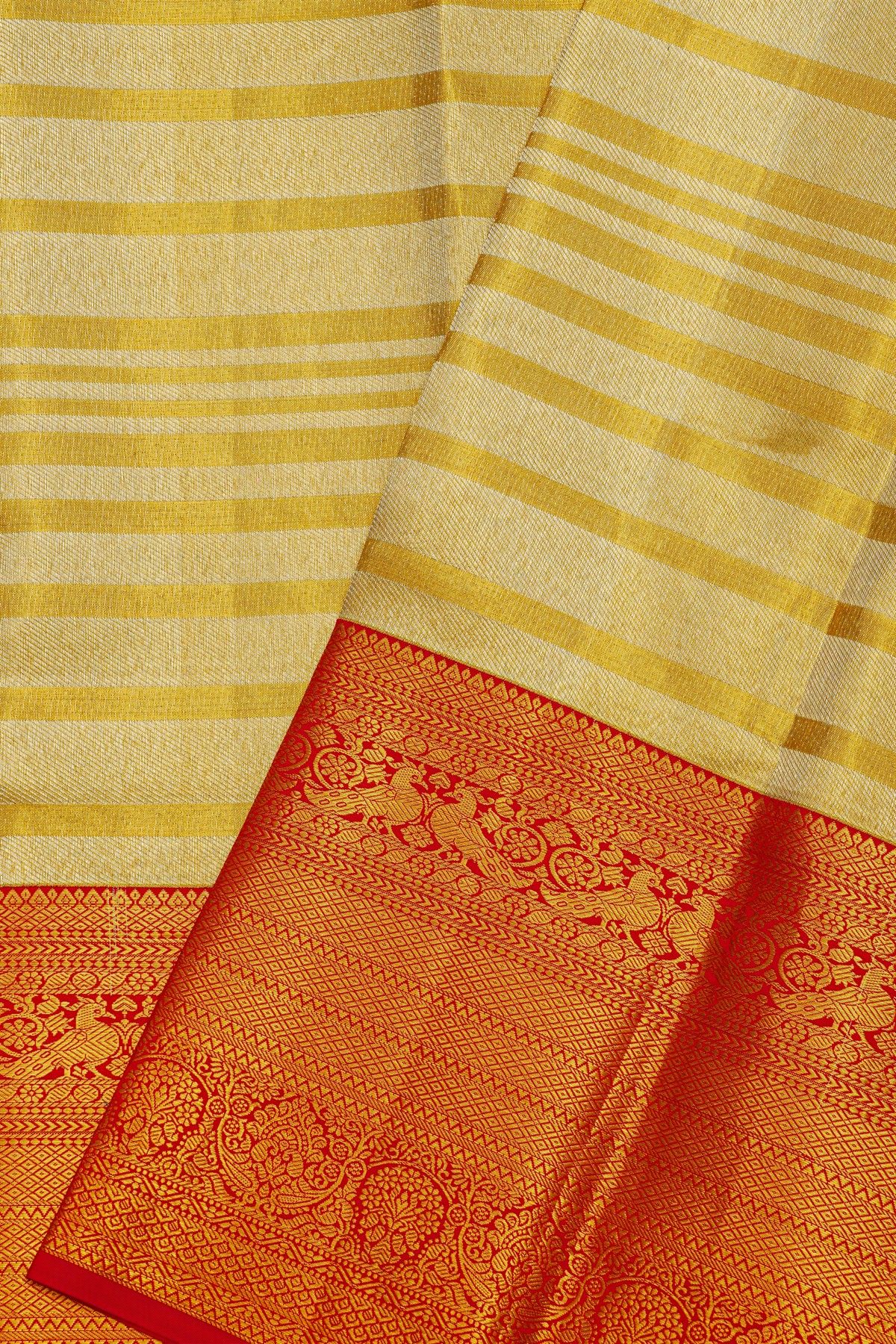 Kancheepuram Silk Golden Yellow Saree With Strips Body And Contrast Florals And Leaves With Peacocks Border