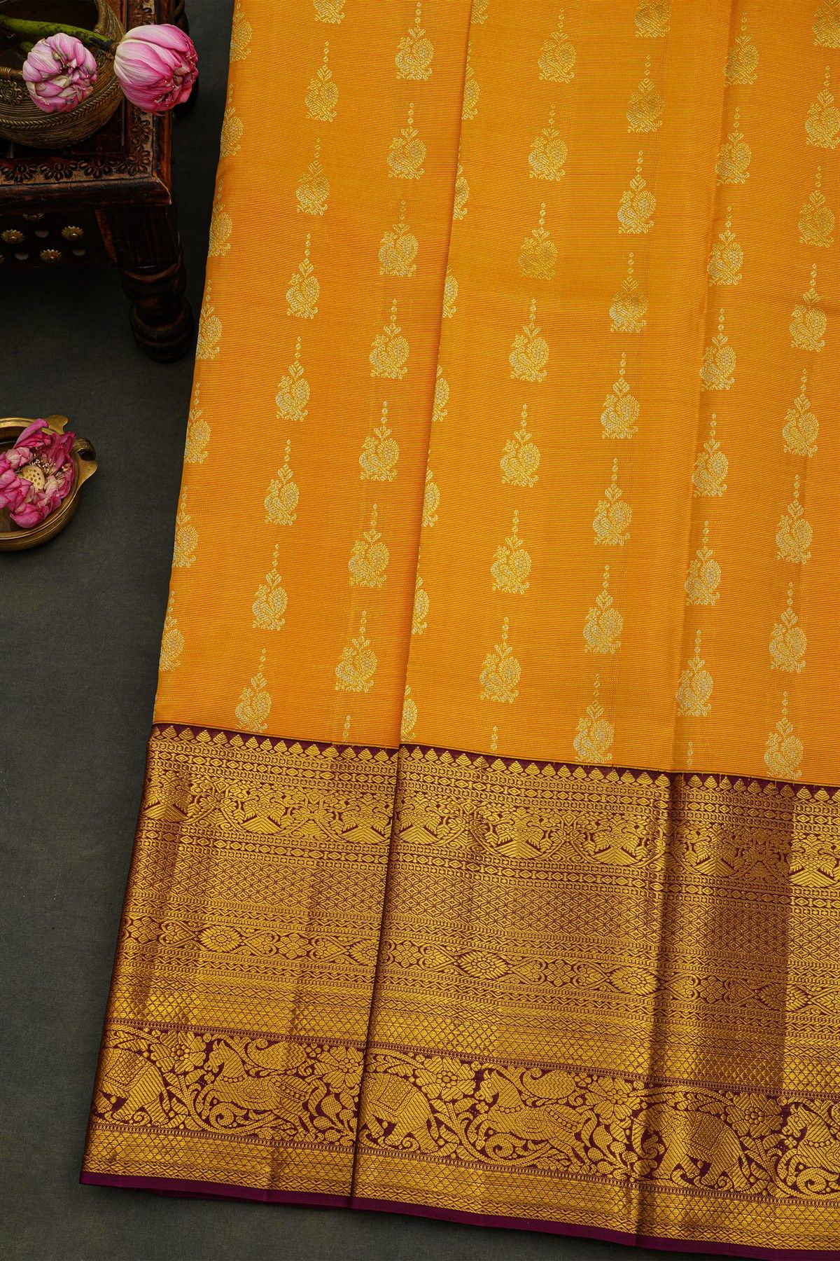 Kancheepuram Silk Yellow Saree With Peacock Buttis Body And Contrast Zari Diamonds, Florals And Animals Border