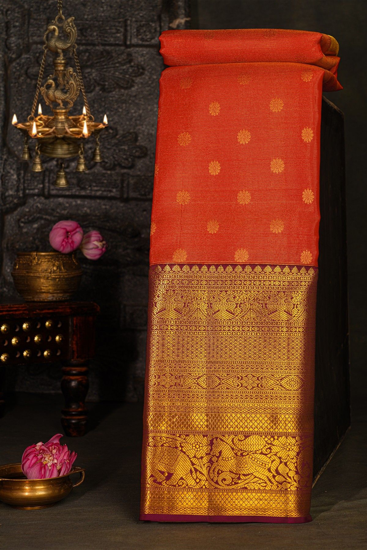 Kancheepuram Silk Red Saree With Florals And Buttis Body And Contrast Zari Diamonds, Florals And Animals Border