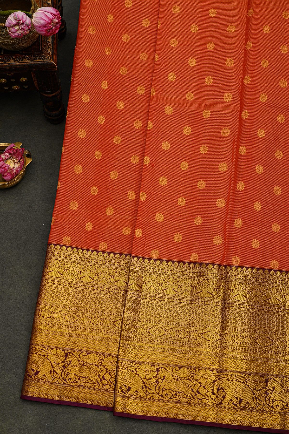 Kancheepuram Silk Red Saree With Florals And Buttis Body And Contrast Zari Diamonds, Florals And Animals Border