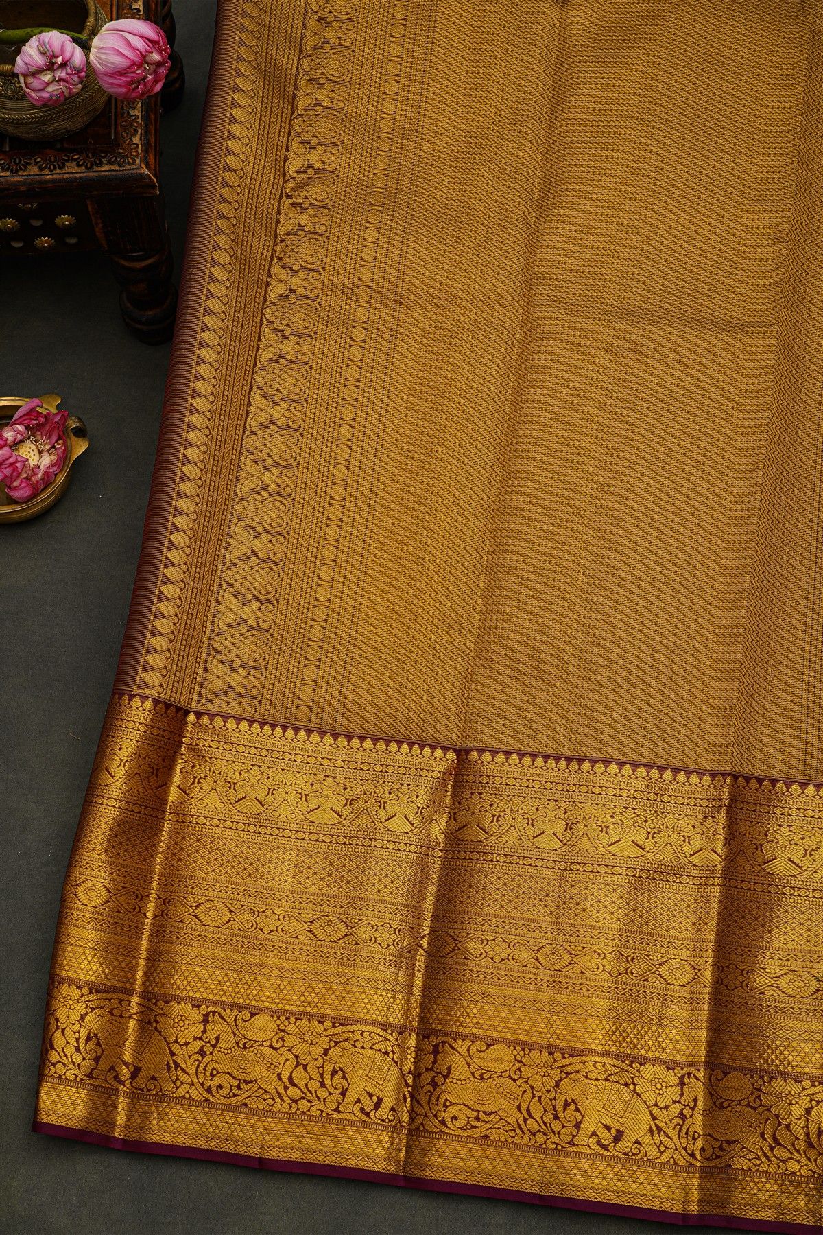 Kancheepuram Silk Red Saree With Florals And Buttis Body And Contrast Zari Diamonds, Florals And Animals Border