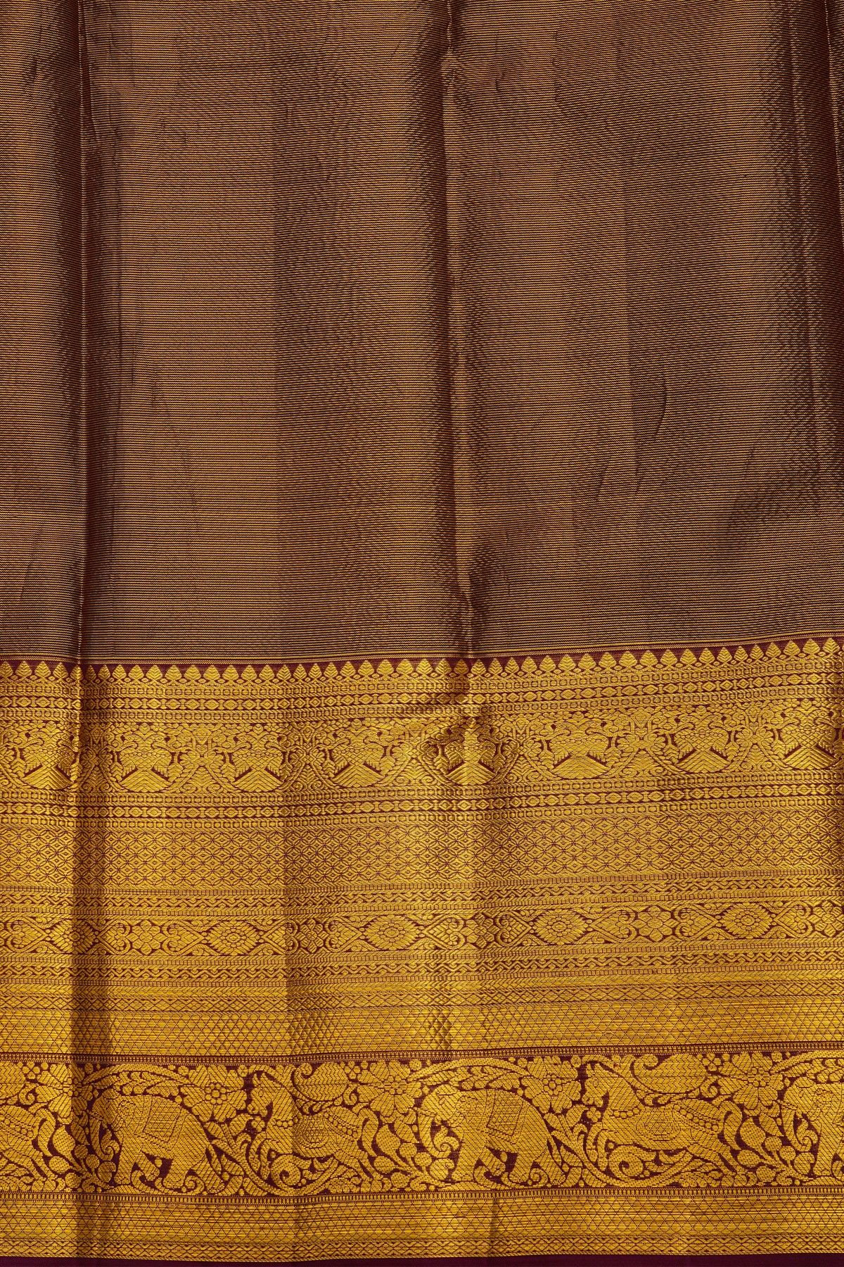 Kancheepuram Silk Red Saree With Florals And Buttis Body And Contrast Zari Diamonds, Florals And Animals Border