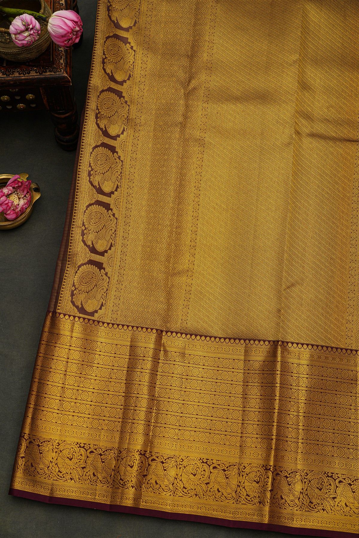 Kancheepuram Silk Yellow Saree With Peacock Buttis Body And Contrast Zari Diamonds, Florals And Animals Border