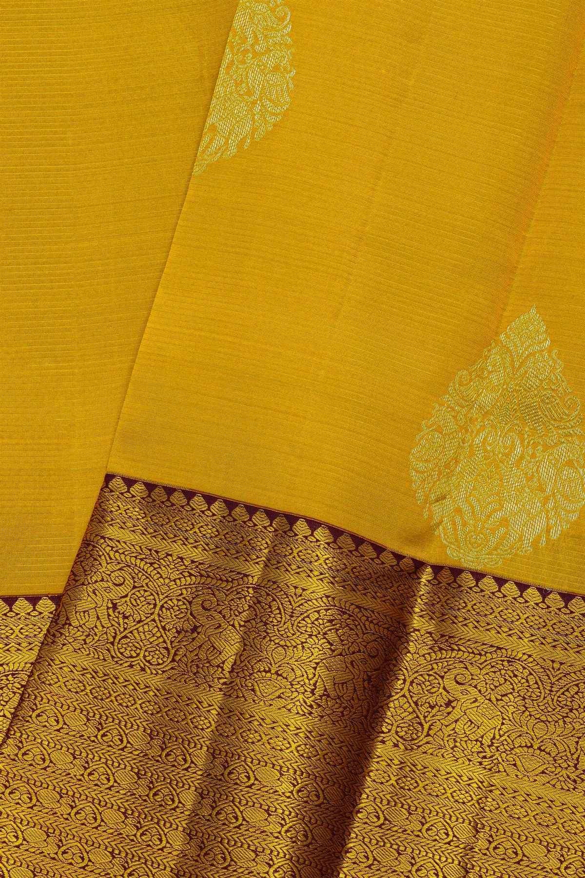 Kancheepuram Silk Golden Yellow Saree With Florals And Leaves Body And Contrast Florals And Leaves Jaal Border