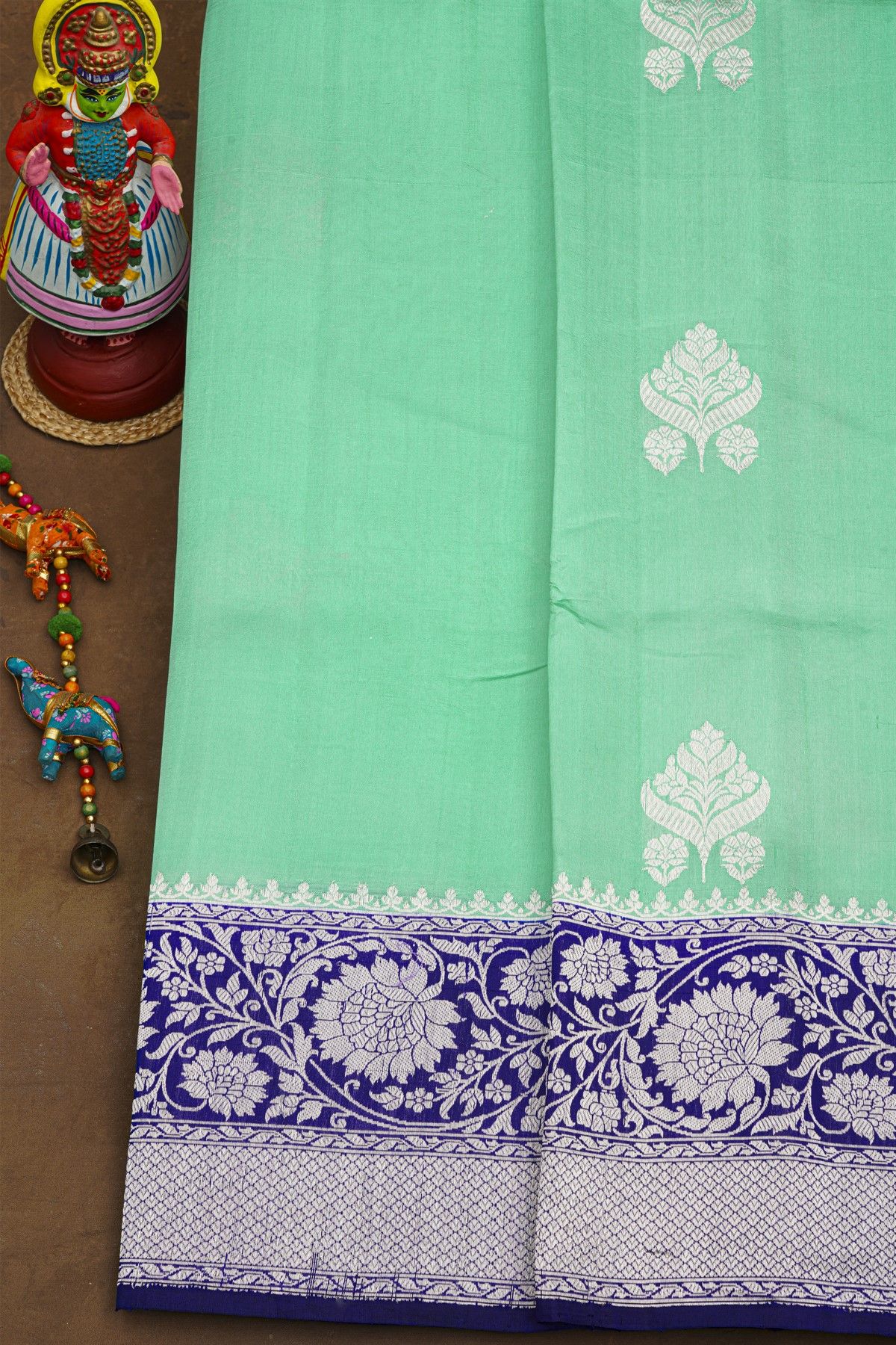 Fancy Matka Silk Sea Green Saree With Florals And Leaves Body