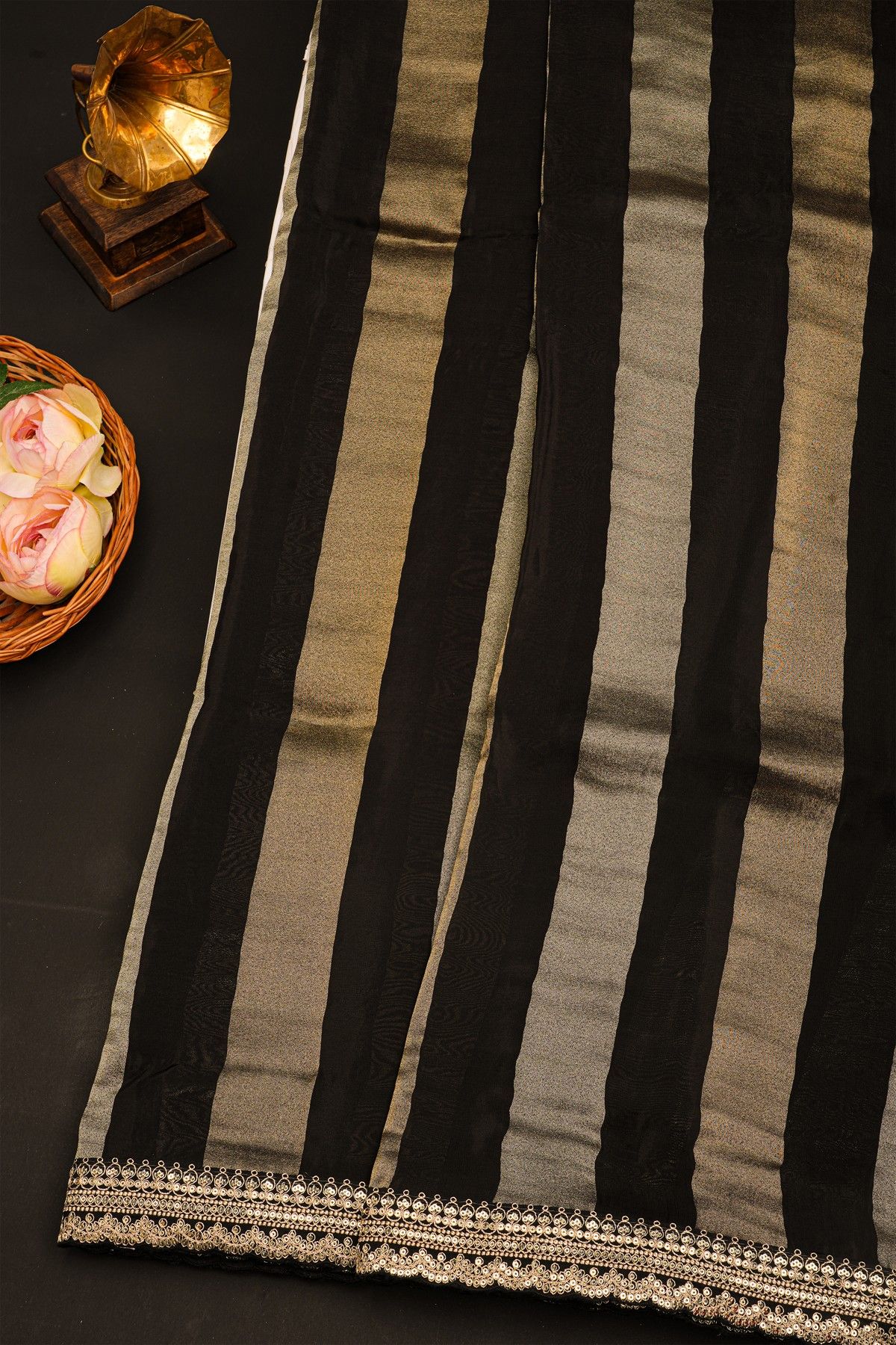 Fancy Kora Black Saree With Florals In Lines Body And Self Design Florals And Leaves In Zardozi Work Border