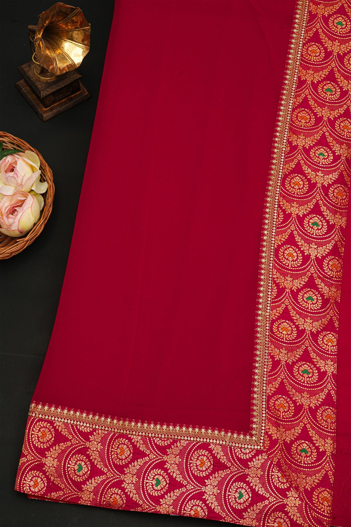 Fancy Crepe Maroon Saree With All Over Plain Body And Self Design Florals And Leaves Jaal Border