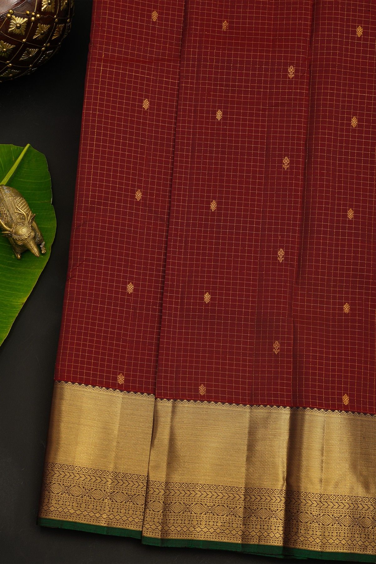 Kancheepuram Silk Maroon Saree With Florals And Leaves In Zari Checks Body And Traditional Kaddi Border