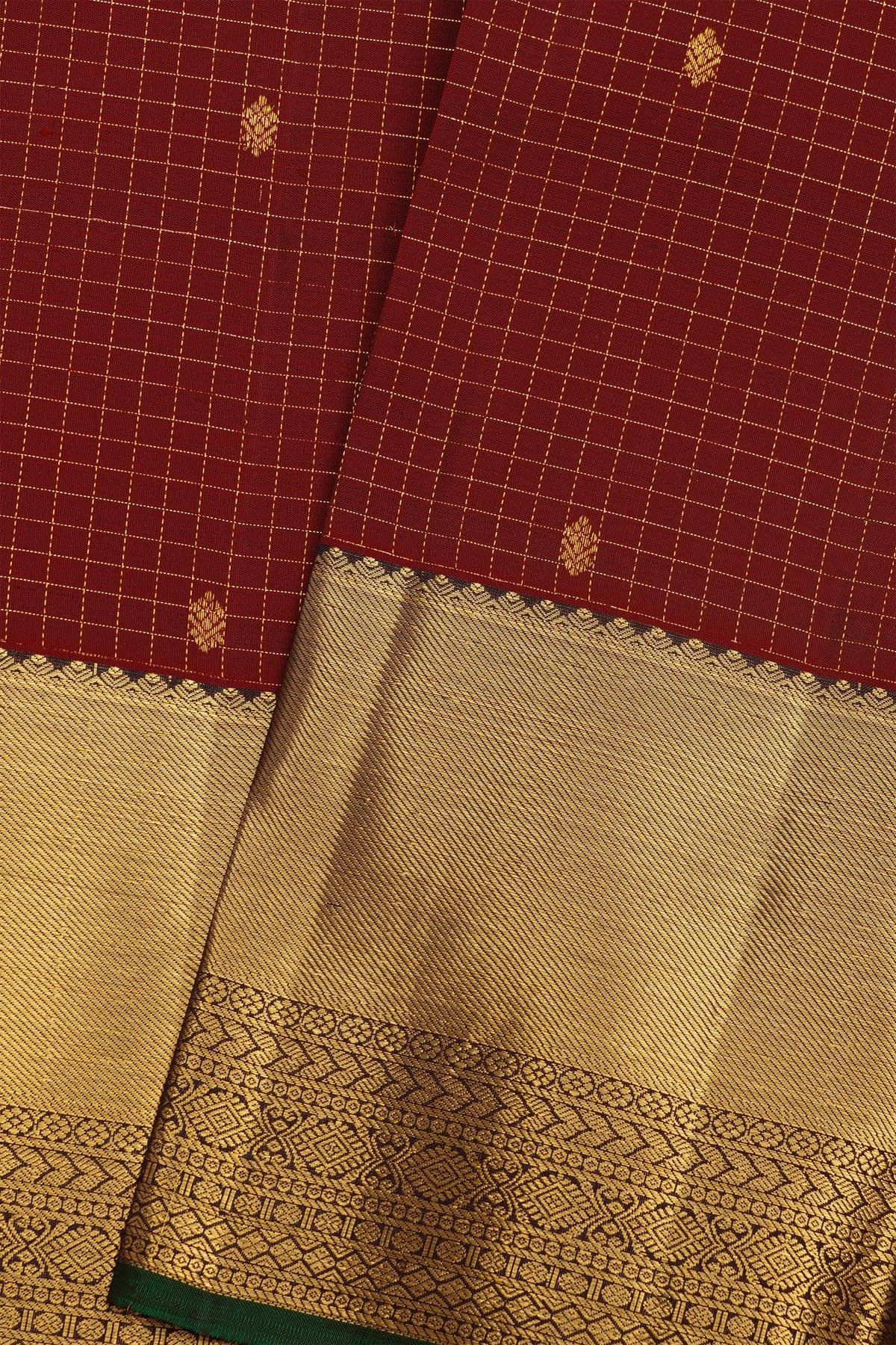 Kancheepuram Silk Maroon Saree With Florals And Leaves In Zari Checks Body And Traditional Kaddi Border